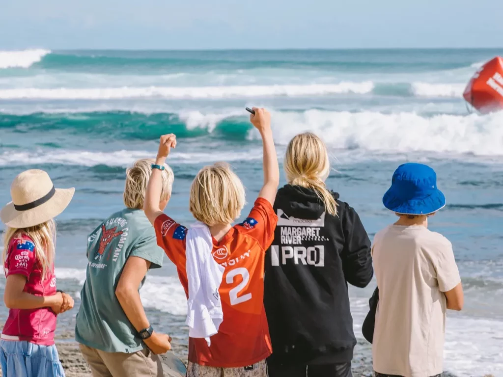 Kids cheering for surfers at Margaret River Pro